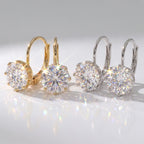 A Classic Solitaire Drop with a Leverback Closure — Gold and Silver options