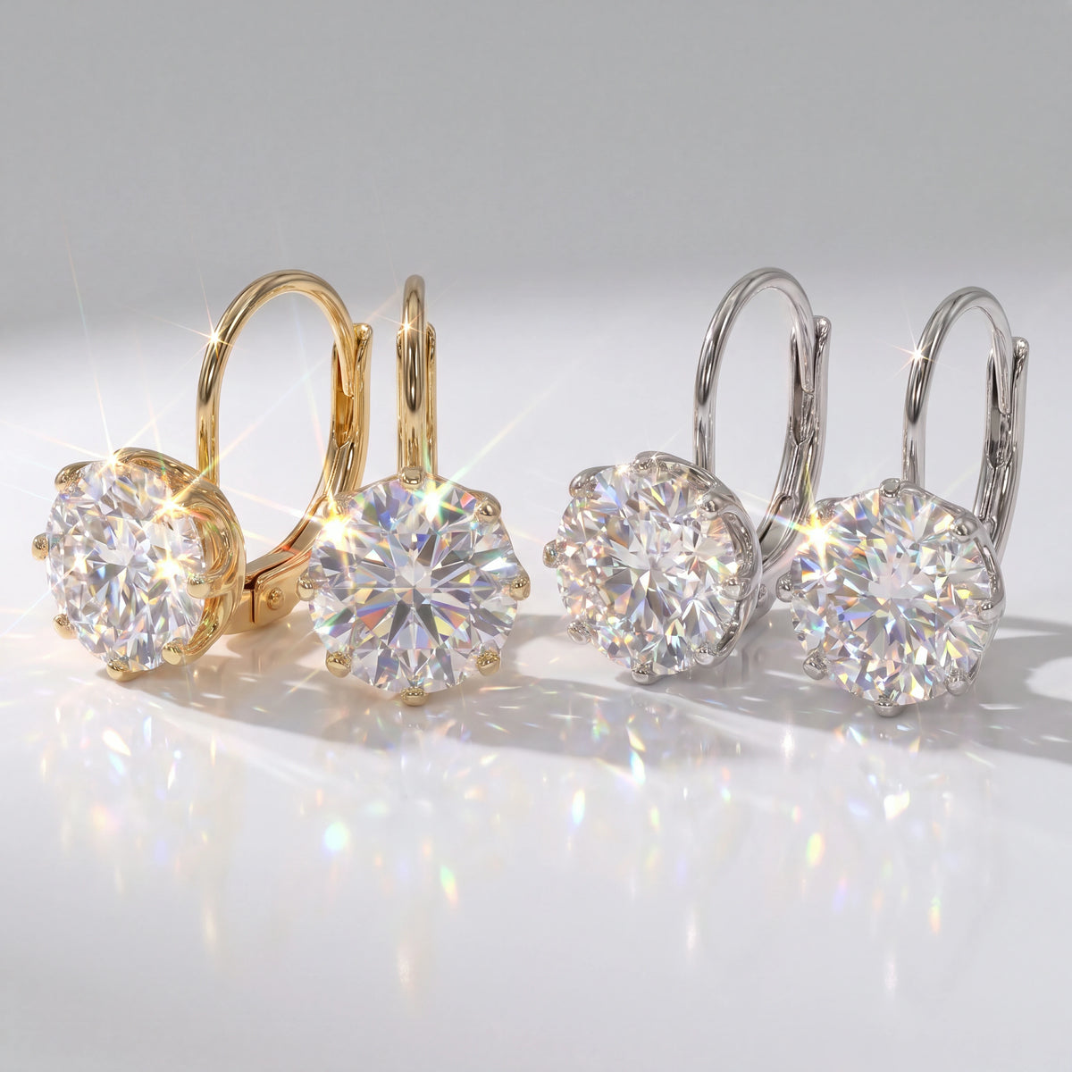A Classic Solitaire Drop with a Leverback Closure — Gold and Silver options