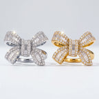 Moissanite bow ring in silver-tone and gold-tone finishes
