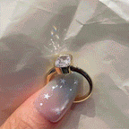 Cushion-Cut Sparkle Framed by a Smooth Bezel — moving product demonstration