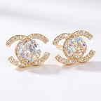 Gold interlocking halo stud earrings