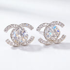 Silver interlocking halo stud earrings