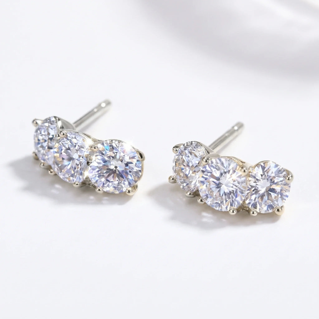 Silver-tone three-stone curved stud earrings